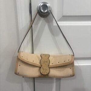 Elegant Tan Clutch with Floral Accents